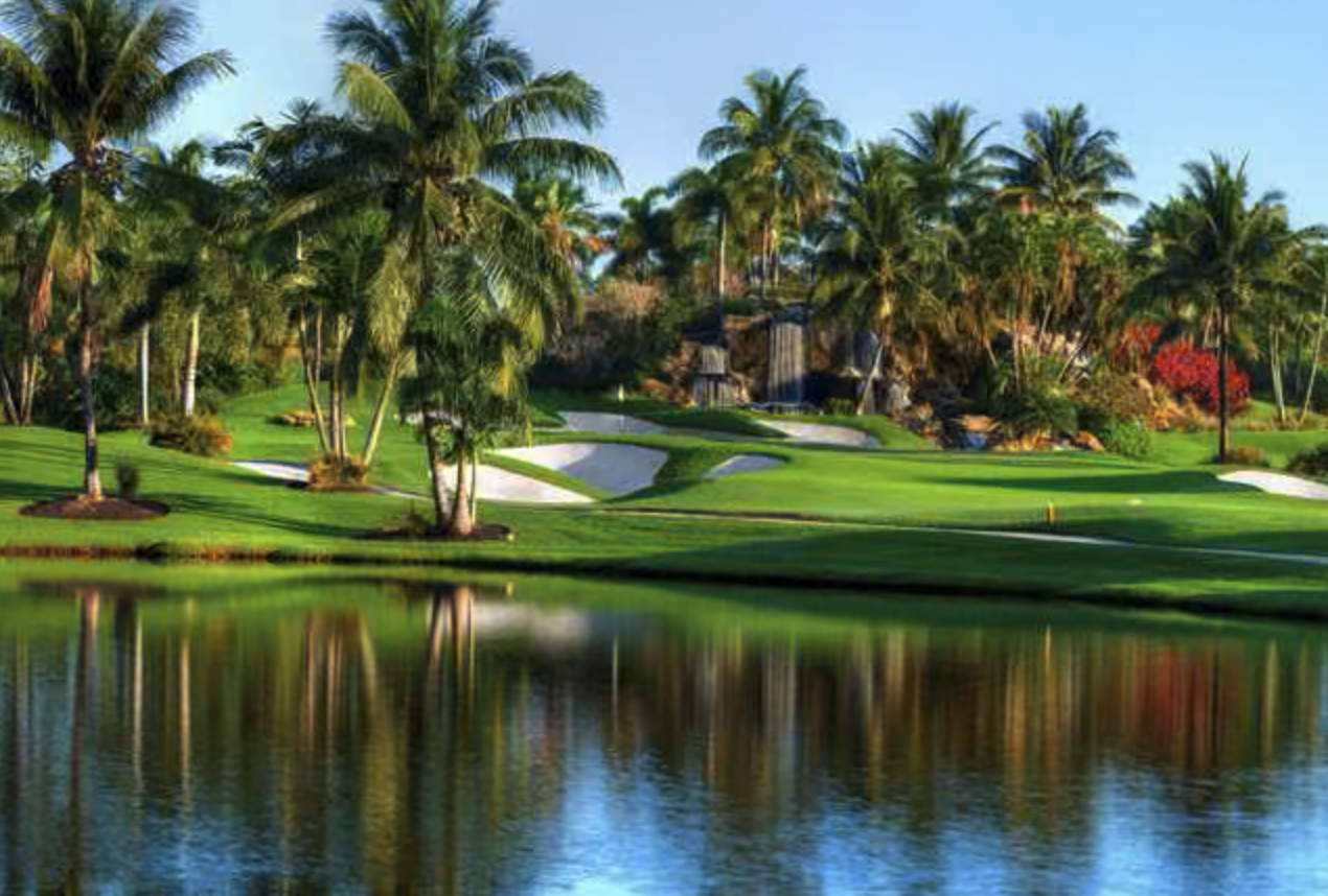 Boca West Country Club fairway with water and palms
